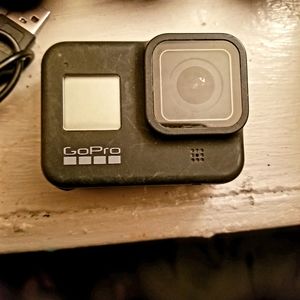 GoPro camera with charger